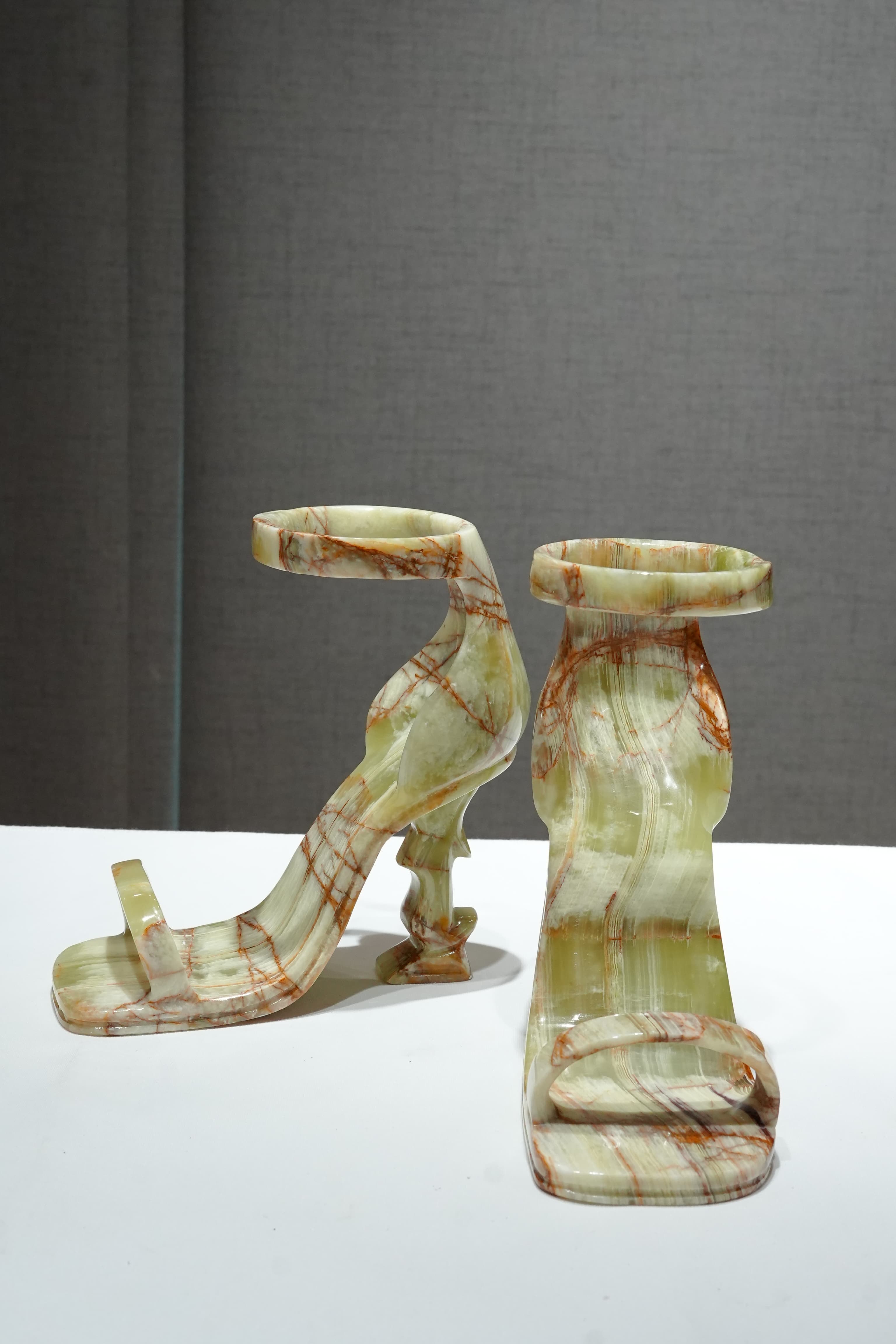 Sculptural onyx ornament carved in the form of a high-heel shoe